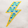 Close up of peacock feather stitches with the lightning bolt