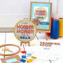 Wonder Woman cross stitch kit with packaging, threads, pattern and fabric