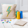 Peacock lightning design on a cushion with threads, fabric and patten