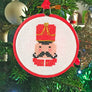 3 inch hoop cross stitch Christmas bauble featuring nut cracker soldier head and shoulders design