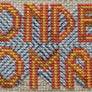 Close up section of stitches from Wonder Woman pattern