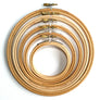 Wooden embroidery hoops from 3 inch to 7 inch placed inside one another