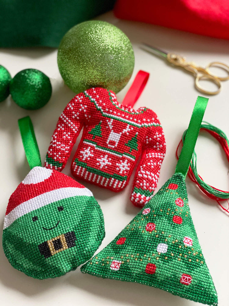 Cross stitch Christmas jumper, cross stitch sprout, Christmas tree shaped bauble with threads and other decorations