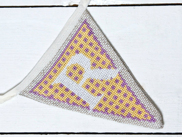 Yellow pastel bunting letter R flag