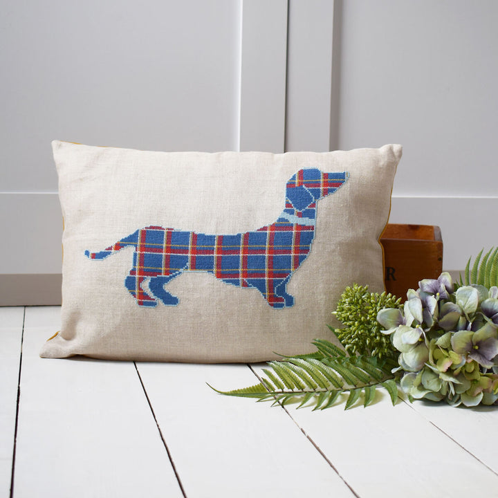 Cushion with cross stitch dachshund design in tartan style