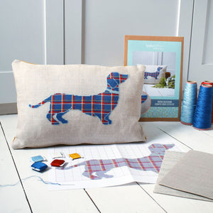 Cross stitch Dachshund kit with threads, pattern, fabric and packaging