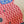 Pink teddy cross stitch pattern close up of stitches.