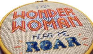 Cross stitched pattern Wonder Woman Hear Me Roar in 6 inch hoop