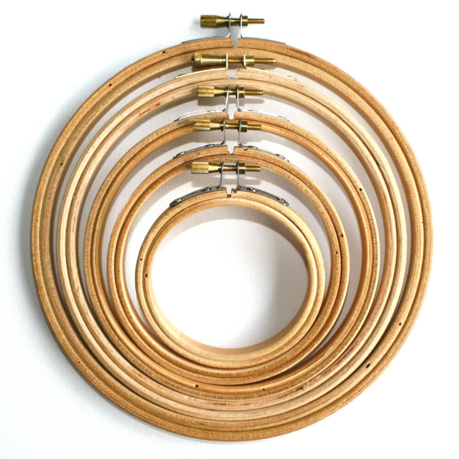 Wooden embroidery hoops from 3 inch to 7 inch placed inside one another